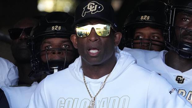Colorado Buffaloes head coach Deion Sanders enters the field before the game against the UCLA Bruins at Rose Bowl. UCLA defeated Colorado 28-16.