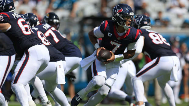 Corey Perrine/Florida Times-Unio / USA TODAY NETWORK, Texans quarterback C.J. Stroud (7) looks to handoff during the third quarter of an NFL football matchup Sunday.