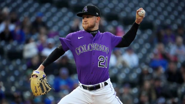 Kyle Freeland delivers a pitch.