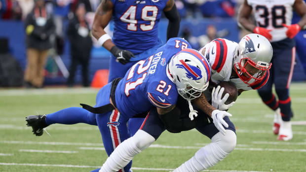 Bills safety Jordan Poyer makes a tackle against the New England Patriots.