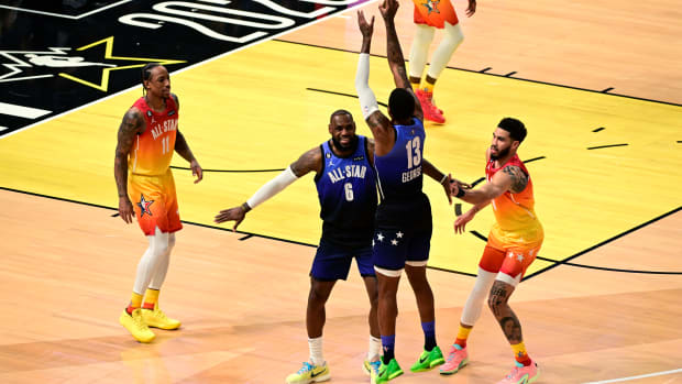 Paul George shoots the ball in the 2023 NBA All-Star Game.