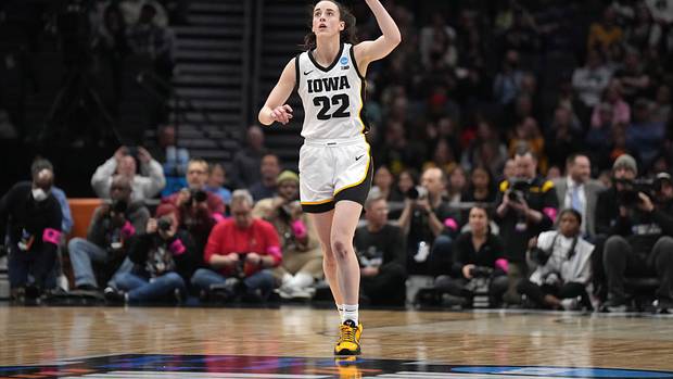Iowa Hawkeyes guard Caitlin Clark reacts during a game.