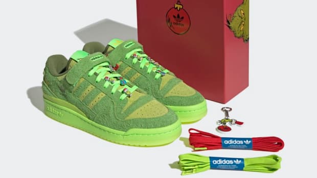 View of 'Grinch' adidas shoes and box.