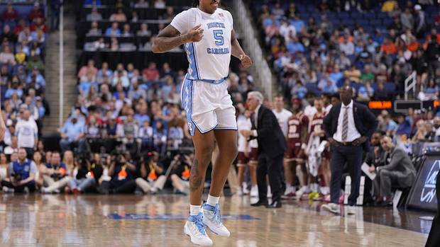 North Carolina Tar Heels forward Armando Bacot hops off after being injured.