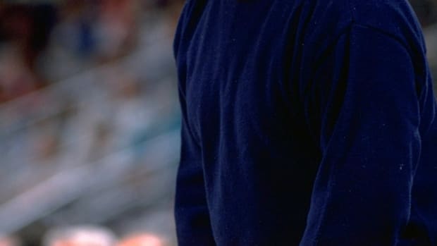 Pete Carril coaches along the sidelines for Princeton.