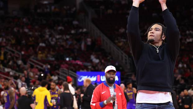 Texans quarterback CJ Stroud throws out the first free throw before the Houston Rockets play the Los Angeles Lakers at Toyota Center.