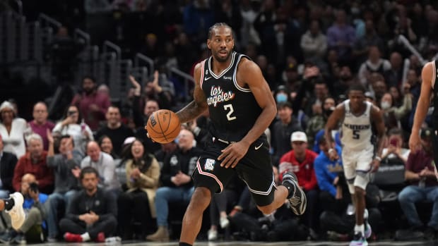 Los Angeles Clippers forward Kawhi Leonard dribbles the ball against the Sacramento Kings.