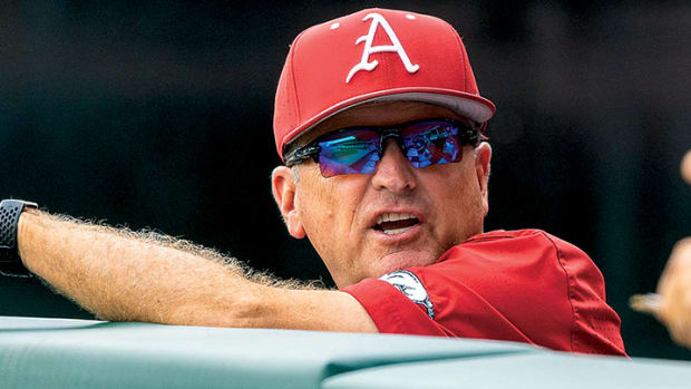 Arkansas coach Dave Van Horn in the dugout during the Fayetteville regional against TCU.