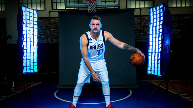 Luka Doncic poses for a photo during media day.