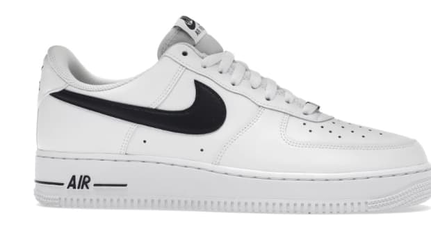 View of white and black Nike shoe.
