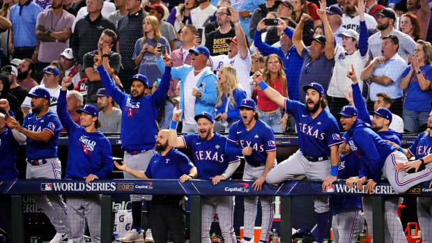 The Texas Rangers reacts after a Texas Rangers second baseman Marcus Semien (not pictured) hit a two run home run during the ninth inning against the Arizona Diamondbacks during game five of the 2023 World Series at Chase Field.