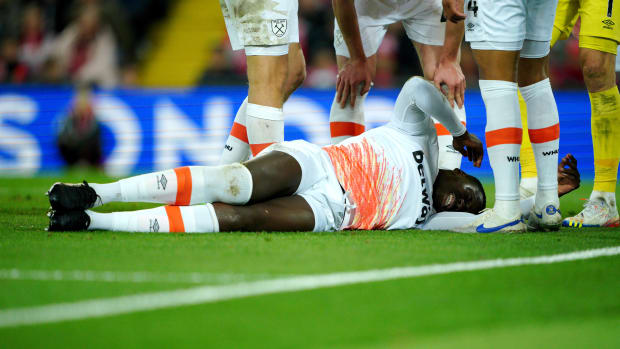 Kurt Zouma pictured laying on the ground at Anfield during West Ham's 1-0 loss to Liverpool in October 2022