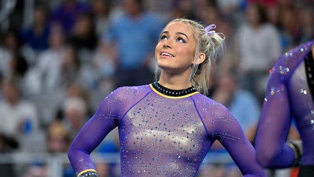Apr 15, 2023; Fort Worth, TX, USA; LSU Tigers gymnast Olivia Dunne practices on floor routine with her team during the NCAA Women's National Gymnastics Tournament Championship at Dickies Arena. Mandatory Credit: Jerome Miron-USA TODAY Sports  