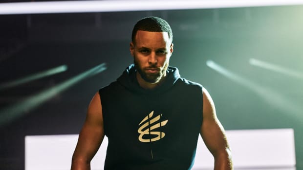 Stephen Curry models Under Armour apparel in a photo shoot.