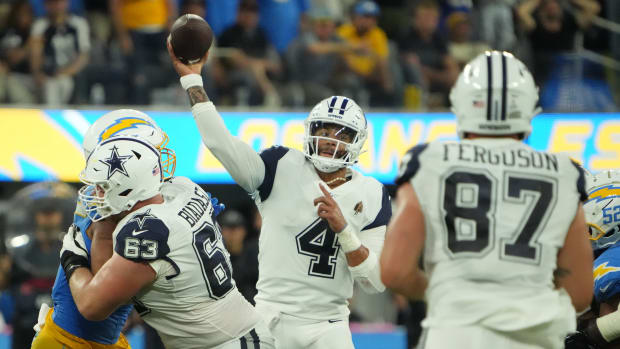 Oct 16, 2023; Inglewood, California, USA; Dallas Cowboys quarterback Dak Prescott (4) carries the ball against the Los Angeles Chargers in the second half at SoFi Stadium. 