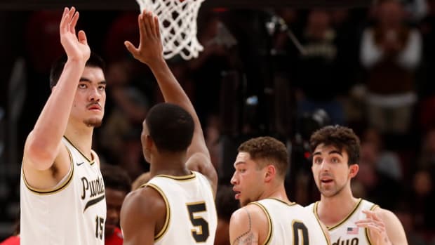 Zach Edey (15) high-fives Purdue Boilermakers guard Brandon Newman (5) during the Big Ten Men s Basketball Tournament game against the Rutgers Scarlet Knights,