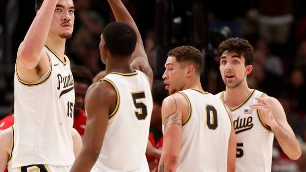 Zach Edey (15) high-fives Purdue Boilermakers guard Brandon Newman (5) during the Big Ten Men s Basketball Tournament game against the Rutgers Scarlet Knights,