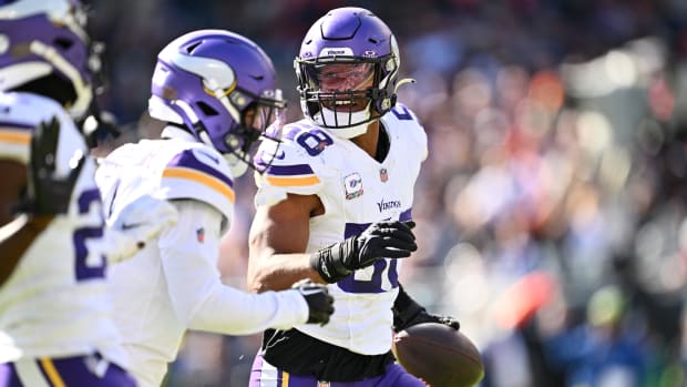 Minnesota Vikings linebacker Jordan Hicks (58) celebrates after making an interception in the first half against the Chicago Bears at Soldier Field.