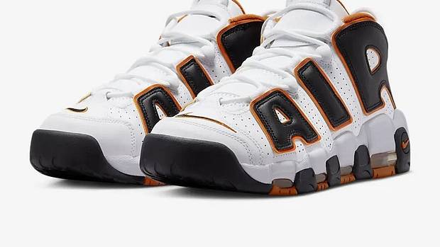 Side view of Scottie Pippen's white and black Nike sneakers.