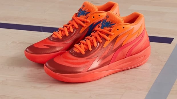 Red and orange Puma basketball shoes.