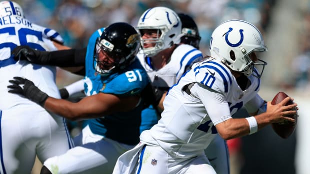 Indianapolis Colts quarterback Gardner Minshew (10) is flushed from the pocket during the third quarter of an NFL football matchup Sunday, Oct. 15, 2023 at EverBank Stadium in Jacksonville, Fla. The Jacksonville Jaguars defeated the Indianapolis Colts 37-20. [Corey Perrine/Florida Times-Union]