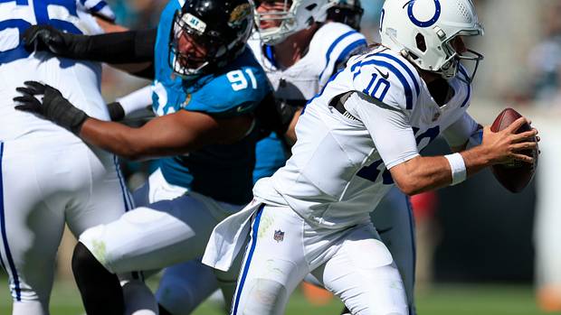 Indianapolis Colts quarterback Gardner Minshew (10) is flushed from the pocket during the third quarter of an NFL football matchup Sunday, Oct. 15, 2023 at EverBank Stadium in Jacksonville, Fla. The Jacksonville Jaguars defeated the Indianapolis Colts 37-20. [Corey Perrine/Florida Times-Union]