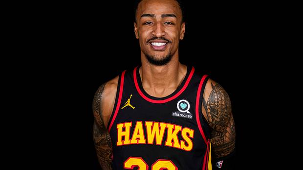 John Collins poses for a photo.