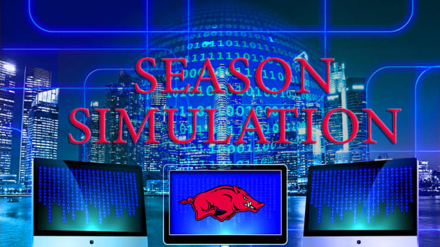 A graphic showing binary code and a Razorback logo indicates an A.I. simulation has been run for the Arkansas football season.