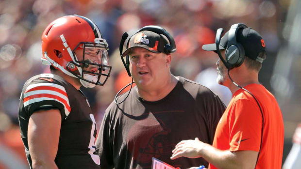 Cleveland Browns quarterback Baker Mayfield (6) meets with Cleveland Browns offensive coordinator Alex Van Pelt, center, and Cleveland Browns head coach Kevin Stefanski during the first half of an NFL football game against the Houston Texans, Sunday, Sept. 19, 2021, in Cleveland, Ohio. [Jeff Lange/Beacon Journal] Browns 10