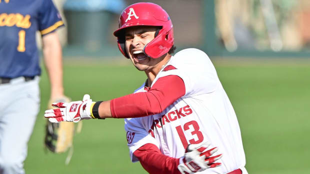 The Hogs' Jayson Jones celebrates a hit against Murray State.