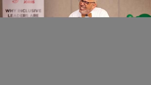 Dr. Derek Greenfield speaks at Hawks x Papa Johns Inclusive Leadership Workshop