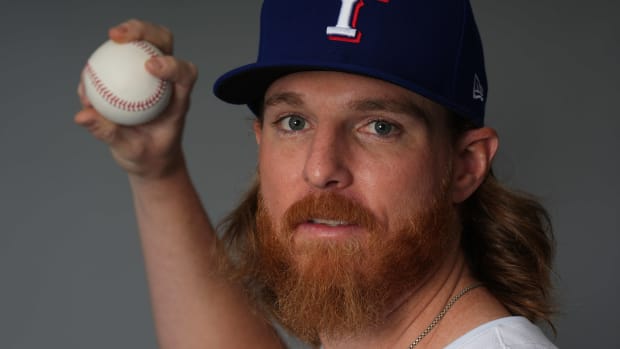 Texas Rangers starting pitcher Jon Gray poses for a photo during Media Day at Surprise Stadium. He made his spring training Cactus League debut with three scoreless innings on Saturday.