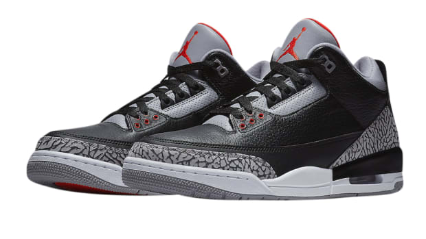 View of black and grey Air Jordan shoes.