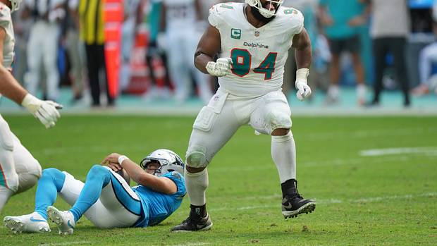 Miami Dolphins defensive tackle Christian Wilkins (94) celebrates a sack of Carolina Panthers quarterback Bryce Young (9) during the fourth quarter of an NFL game at Hard Rock Stadium in Miami Gardens, Oct. 15, 2023.