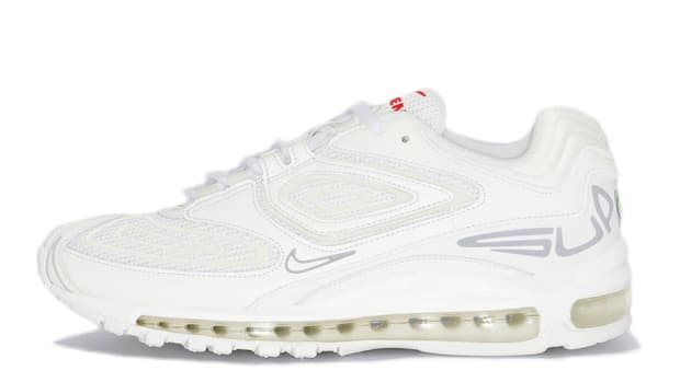 White Nike Air Max shoe.