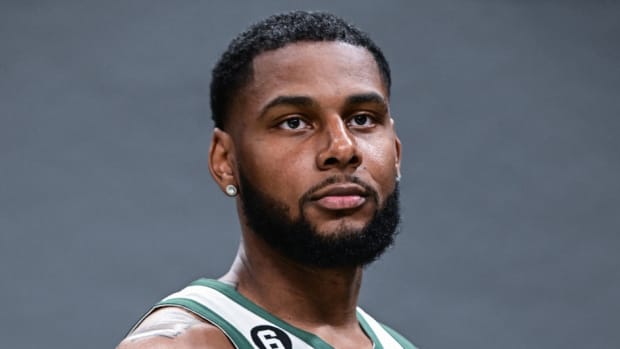 Milwaukee Bucks center Marques Bolden (15) poses for a picture