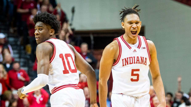 Indiana's Malik Reneau (5) celebrates Kaleb Banks (10) dunk during the first half of the Indiana versus Purdue men's basketball game at Simon Skjodt Assembly Hall on Saturday, Feb. 4, 2023.