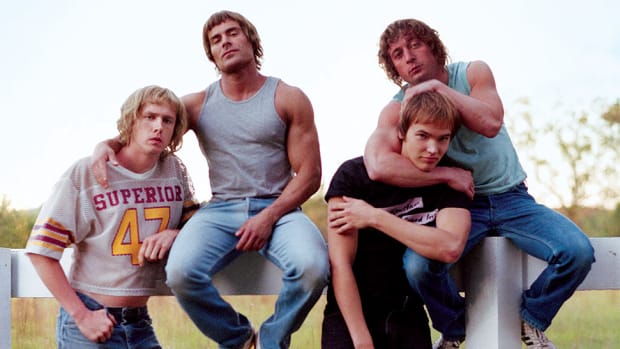 The actors from "The Iron Claw" pose for a promotional shoot on the set of the Von Erich family farm in Texas.