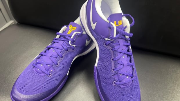 View of LSU Tigers' purple Nike Kobe sneakers.