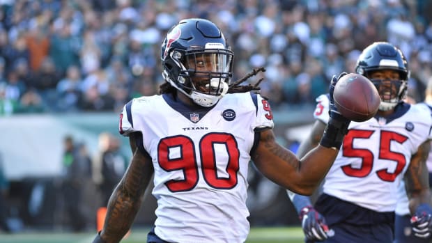 Houston Texans outside linebacker Jadeveon Clowney (90) celebrates after recovering fumble against the Philadelphia Eagles during the second quarter at Lincoln Financial Field.