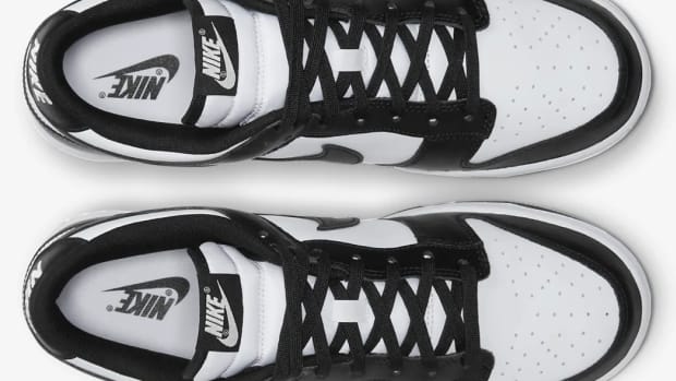View of white and black Nike Dunk shoes.