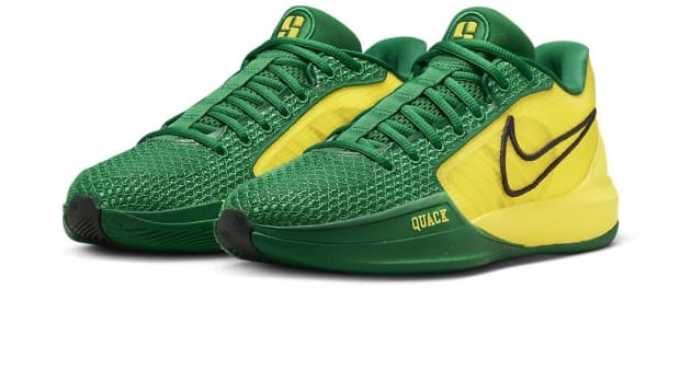 Sabrina Ionescu's green and yellow Nike sneakers.