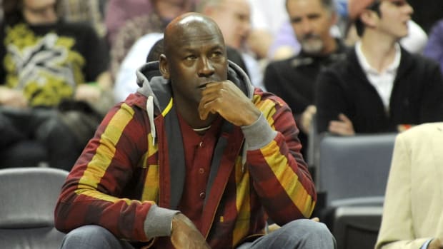 March 9, 2011; Charlotte Bobcats team owner Michael Jordan watching the game at Time Warner Cable Arena