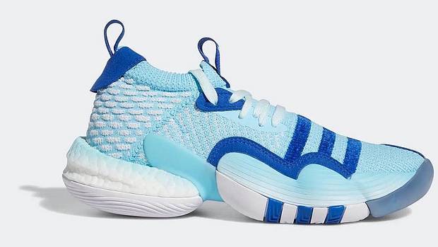 Side view of Trae Young's blue and white adidas shoe.