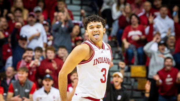 Indiana's Anthony Leal (3) celebrates his three-pointer over during the first half of the Indiana versus Iowa men's basketball game at Simon Skjodt Assembly Hall.