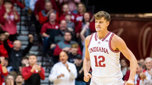 Indiana's Miller Kopp (12) reacts after making a three-pointer during the first half ot the Indiana versus Northwestern men's basketball game at Simon Skjodt Assembly Hall on Sunday, Jan. 8, 2023.
