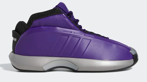Side view of purple Adidas Crazy 1 basketball shoe.