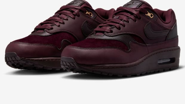Burgundy Nike Air Max shoes.