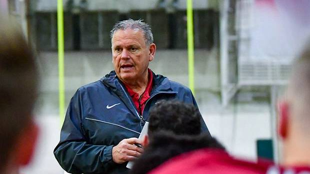 Arkansas coach Sam Pittman addresses the team during spring practices.