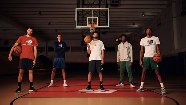Zach LaVine, Darius Bazley, Jamal Murray, Aaron Nesmith, and Dejounte Murray stand on a basketball court.